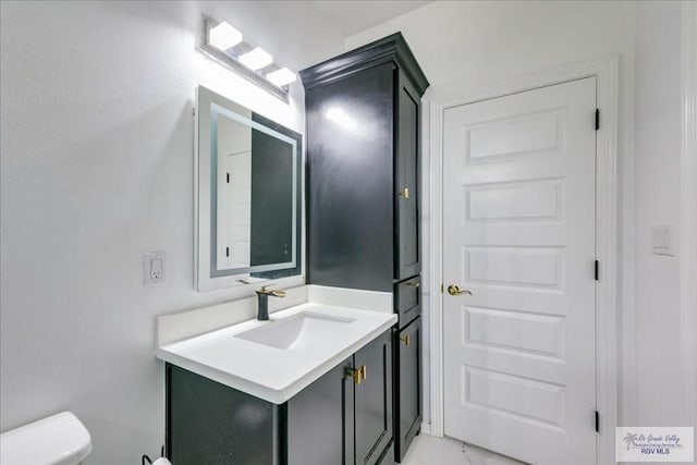 3213 E Westgate Cir, Harlingen, TX 78552 - half bathroom with toilet and vanity