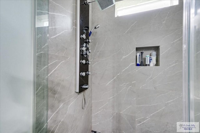 3213 E Westgate Cir, Harlingen, TX 78552 - bathroom with a marble finish shower