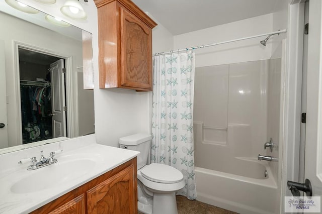 full bathroom featuring shower / bath combo with shower curtain, vanity, and toilet