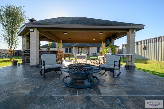 view of patio featuring a gazebo and an outdoor bar