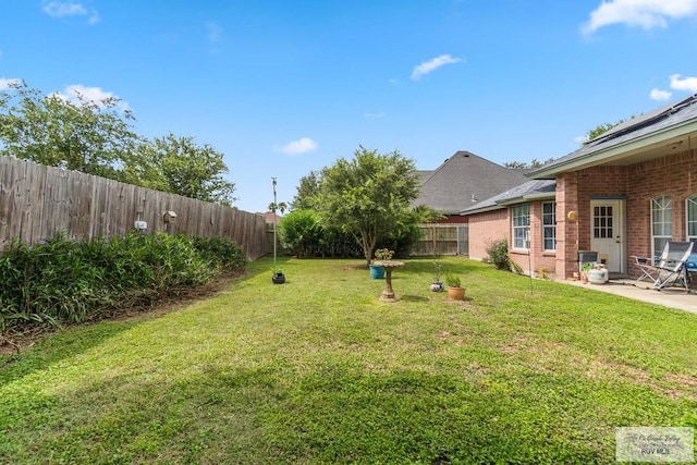 2518 Thomas Ln, Harlingen, TX 78550 - view of yard featuring a patio