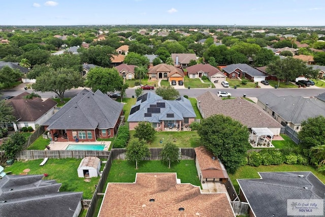 2518 Thomas Ln, Harlingen, TX 78550 - aerial perspective of suburban area featuring a pool area