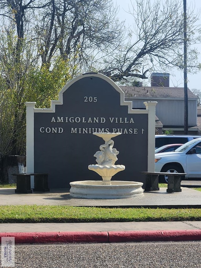 view of community sign