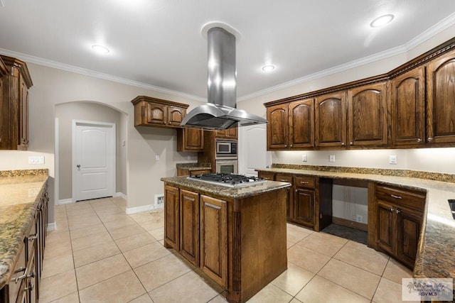 5302 Remington Dr, Harlingen, TX 78552 - kitchen featuring island range hood, appliances with stainless steel finishes, ornamental molding, light tile patterned flooring, and a kitchen island