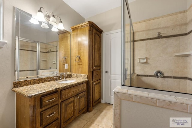 5302 Remington Dr, Harlingen, TX 78552 - full bath featuring tiled shower, tile patterned flooring, and vanity