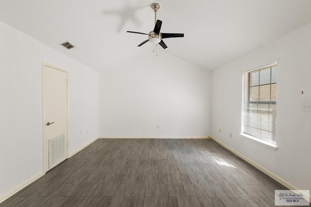 unfurnished room with ceiling fan, dark wood-type flooring, and lofted ceiling