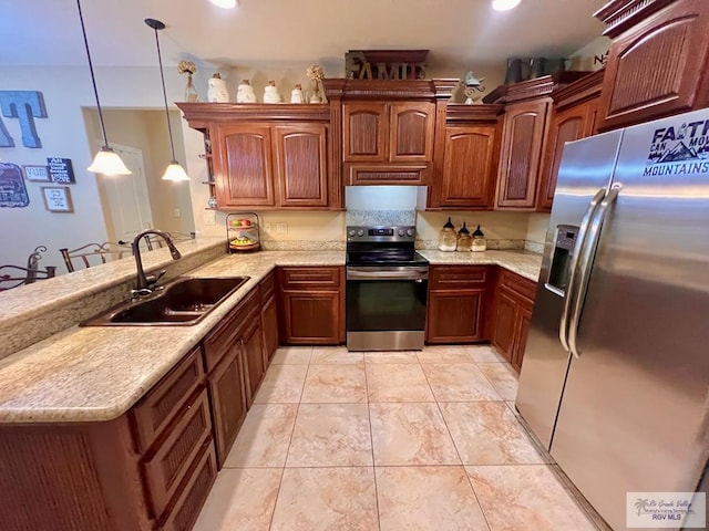 kitchen with sink, kitchen peninsula, pendant lighting, a kitchen bar, and appliances with stainless steel finishes