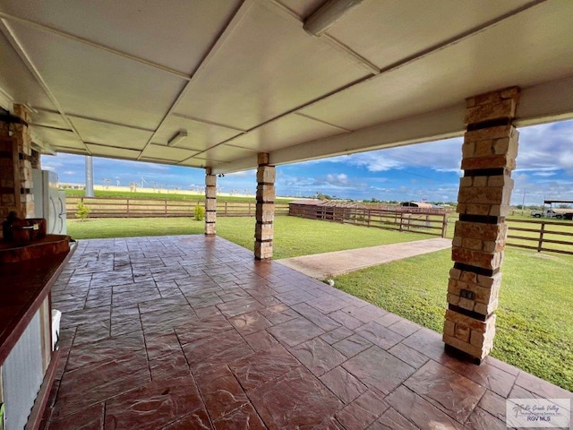 view of patio / terrace featuring a rural view