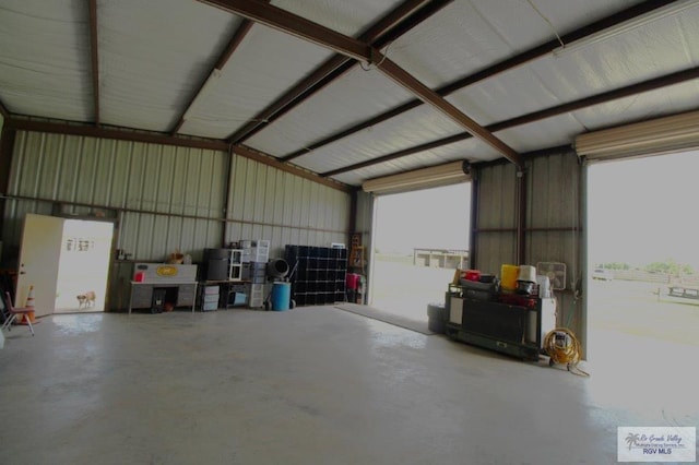 garage featuring a carport