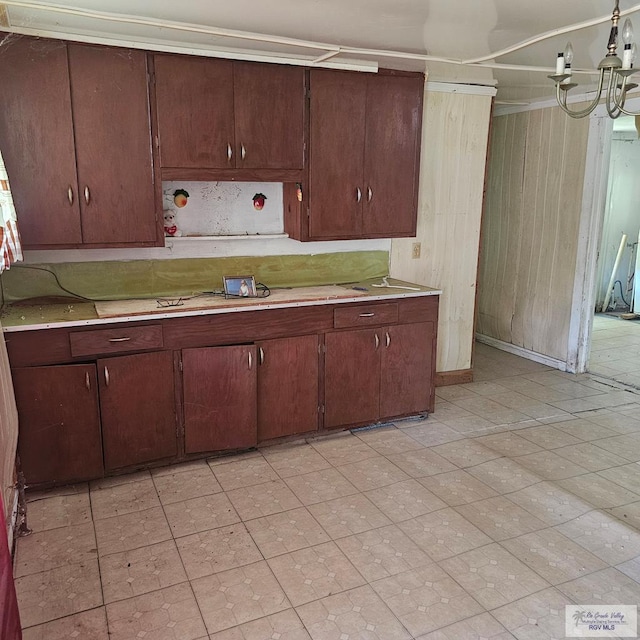 1130 N Sunset Dr, Harlingen, TX 78550 - kitchen featuring light countertops, decorative backsplash, light flooring, and open shelves