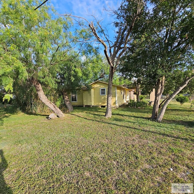 1130 N Sunset Dr, Harlingen, TX 78550 - view of grassy yard