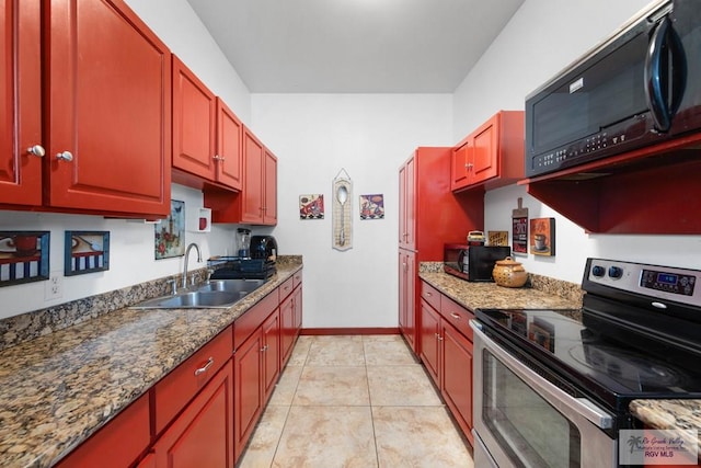 kitchen featuring stainless steel electric stove, sink, light tile patterned floors, and stone countertops