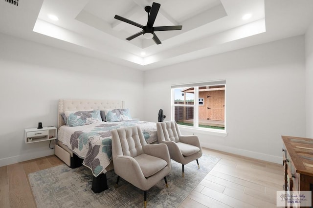 9073 New Orleans Ct, Los Fresnos, TX 78566 - bedroom with a raised ceiling, wood finished floors, recessed lighting, baseboards, and a ceiling fan
