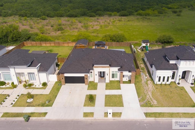 9073 New Orleans Ct, Los Fresnos, TX 78566 - aerial view of property and surrounding area featuring a heavily wooded area