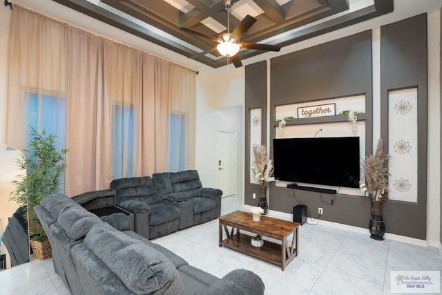 living room featuring a high ceiling, coffered ceiling, ceiling fan, and beamed ceiling