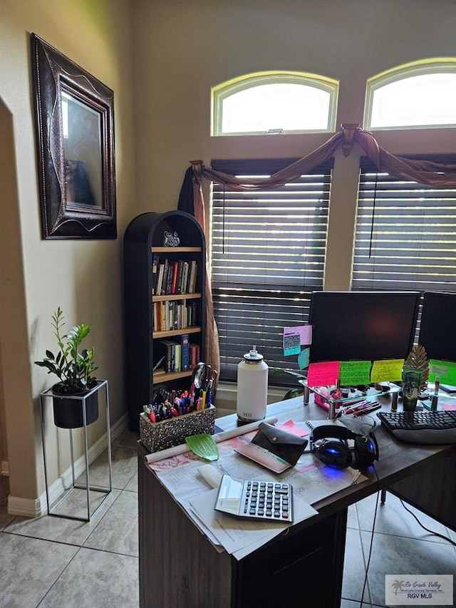 2104 Tomatillo Dr, Weslaco, TX 78596 - office space with plenty of natural light, baseboards, and light tile patterned floors