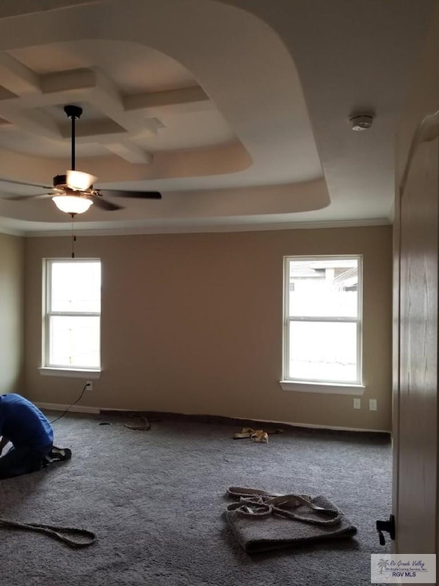 2104 Tomatillo Dr, Weslaco, TX 78596 - carpeted empty room with a smoke detector, a ceiling fan, ornamental molding, a raised ceiling, and coffered ceiling