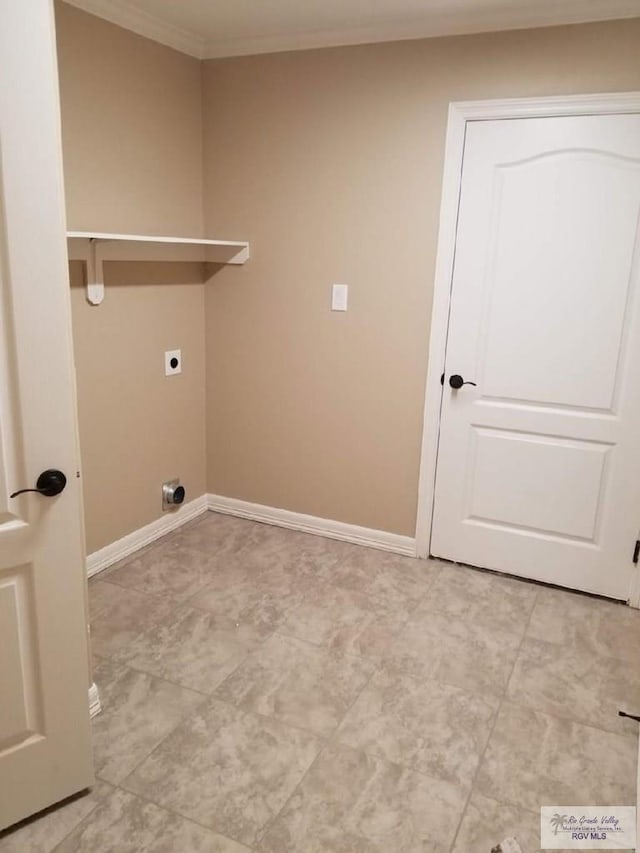 2104 Tomatillo Dr, Weslaco, TX 78596 - washroom with hookup for an electric dryer, ornamental molding, and baseboards