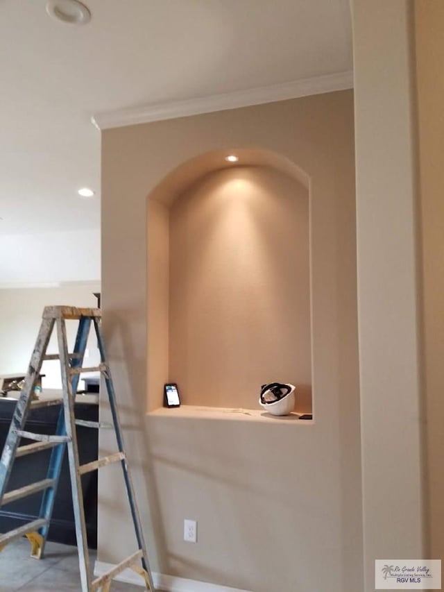 2104 Tomatillo Dr, Weslaco, TX 78596 - detailed view of crown molding, arched walkways, recessed lighting, and baseboards
