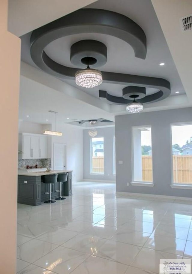 interior space featuring a tray ceiling