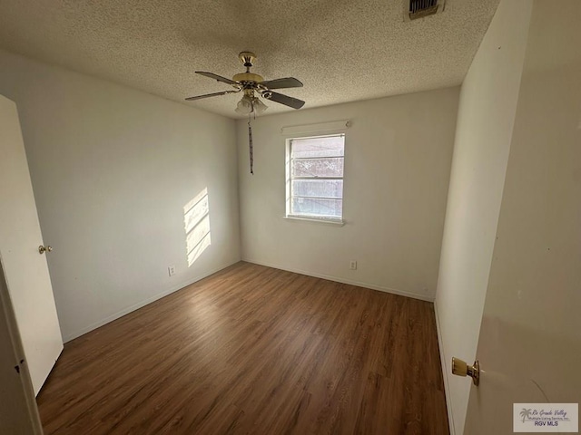 504 Galveston Rd, Brownsville, TX 78521 - empty room featuring visible vents, ceiling fan, a textured ceiling, and wood finished floors