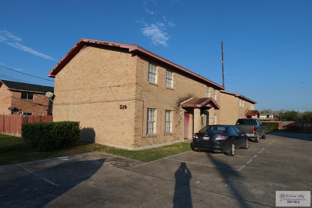 504 Galveston Rd, Brownsville, TX 78521 - exterior space with fence and brick siding