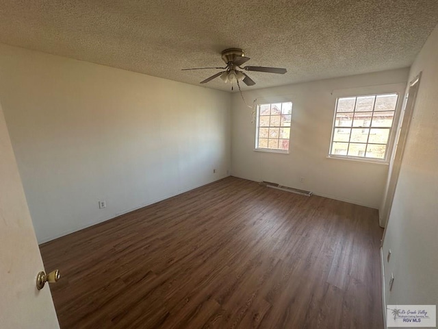 504 Galveston Rd, Brownsville, TX 78521 - unfurnished room with visible vents, ceiling fan, a textured ceiling, and wood finished floors