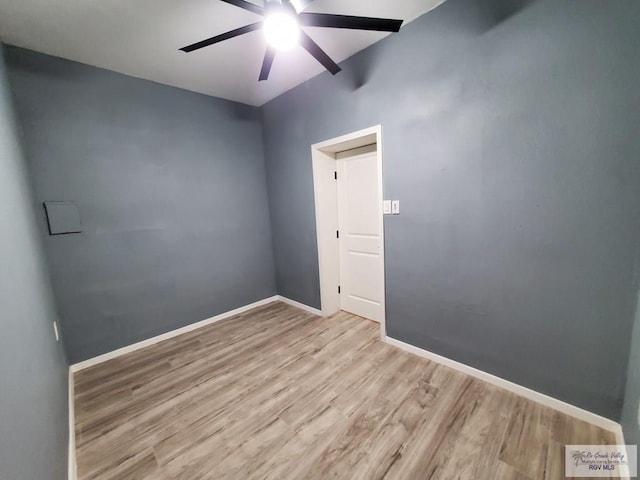 unfurnished room featuring light hardwood / wood-style flooring and ceiling fan