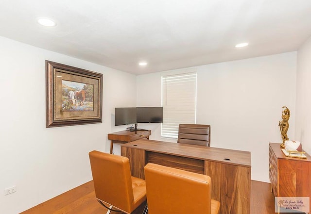 home office featuring light hardwood / wood-style floors