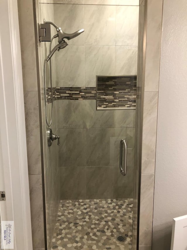 bathroom with walk in shower