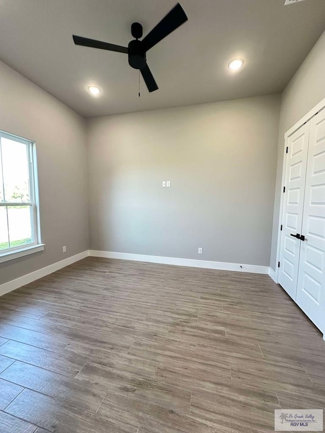 3414 Bryan Dr, Harlingen, TX 78550 - empty room featuring recessed lighting, baseboards, a ceiling fan, and wood finished floors