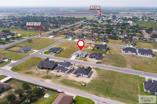 9817 Heights N, Harlingen, TX 78552 - aerial overview of property's location with nearby suburban area