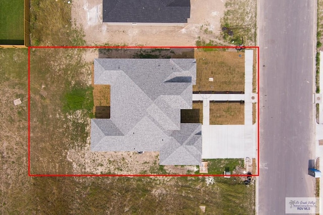 9817 Heights N, Harlingen, TX 78552 - aerial view of property and surrounding area featuring property parcel outlined