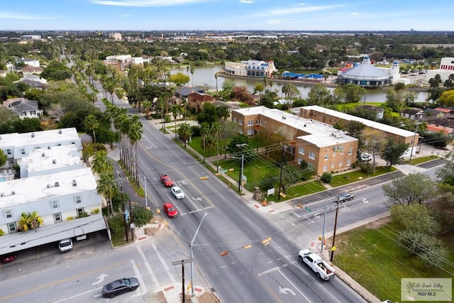 birds eye view of property featuring a water view