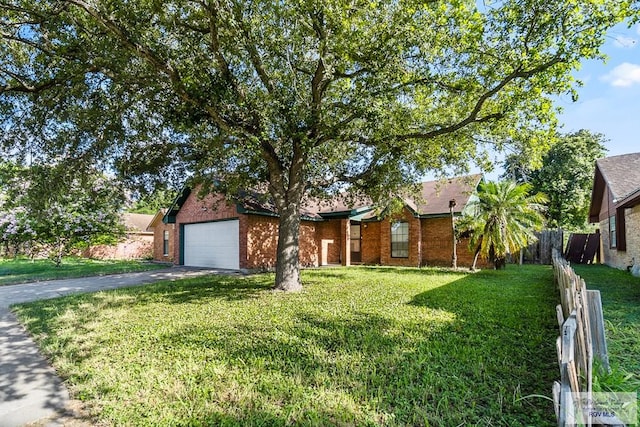 ranch-style house with a front yard and a garage