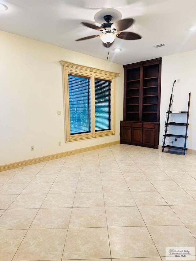 7232 Lago Viejo Blvd, Brownsville, TX 78520 - unfurnished living room featuring a ceiling fan, light tile patterned floors, and baseboards