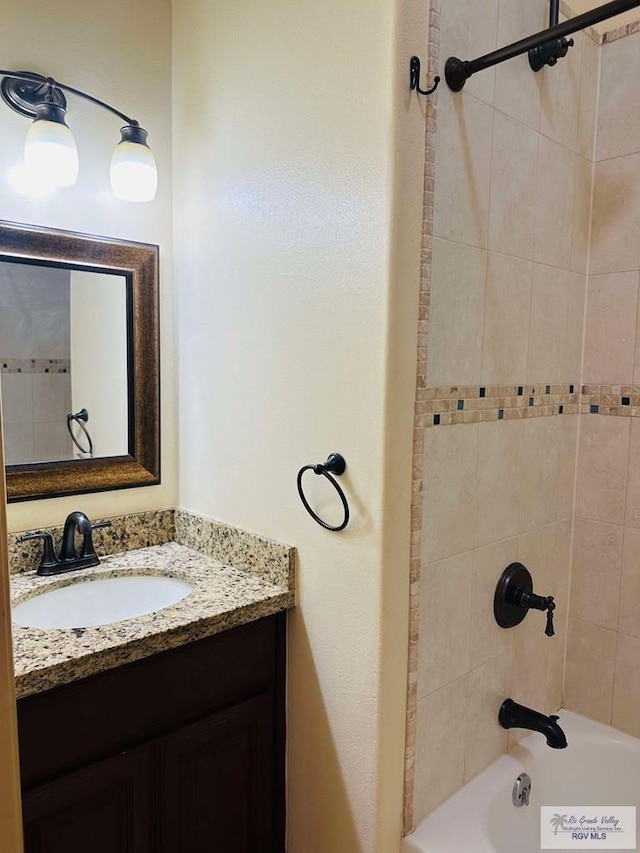 7232 Lago Viejo Blvd, Brownsville, TX 78520 - bathroom featuring vanity and washtub / shower combination