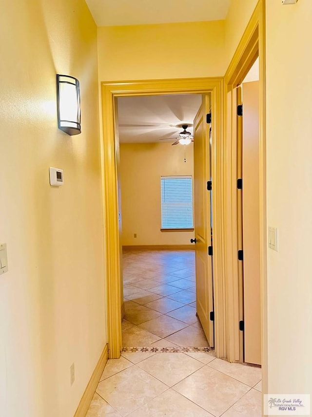 7232 Lago Viejo Blvd, Brownsville, TX 78520 - corridor featuring light tile patterned flooring and baseboards