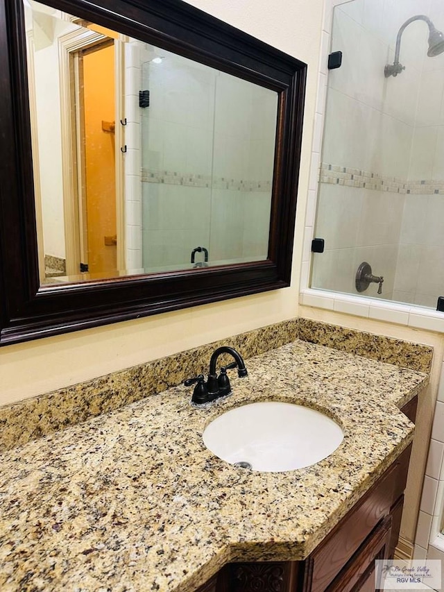 7232 Lago Viejo Blvd, Brownsville, TX 78520 - bathroom featuring a stall shower and vanity