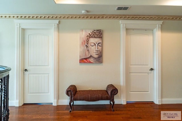 hallway with dark hardwood / wood-style floors