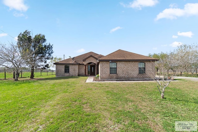 view of front of property with a front lawn