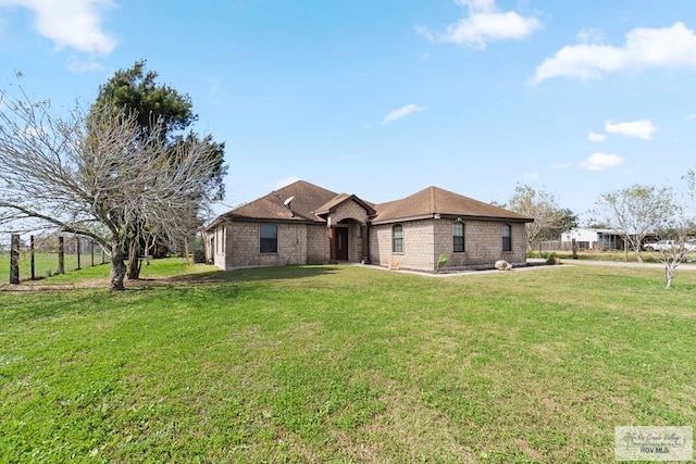 view of front of home with a front lawn