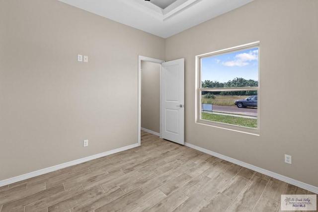 5112 Blackhawk Ave, Rio Grande City, TX 78582 - empty room with light wood-style floors and baseboards