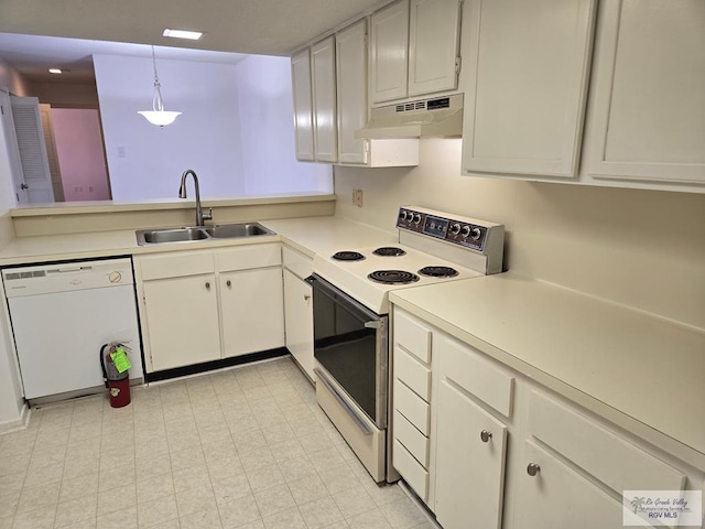 kitchen with white cabinetry, sink, hanging light fixtures, and white appliances