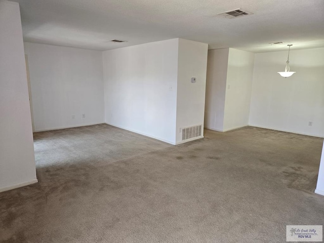 unfurnished room featuring carpet floors