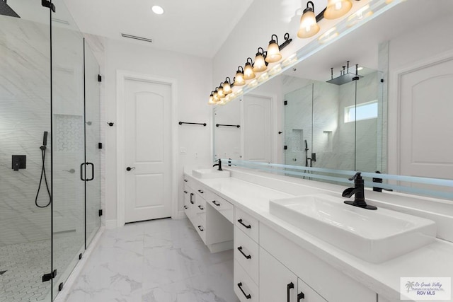 bathroom featuring vanity and walk in shower