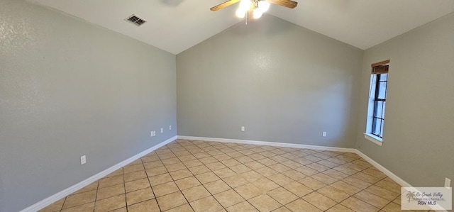 spare room featuring vaulted ceiling and ceiling fan