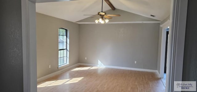 unfurnished room featuring ceiling fan, light hardwood / wood-style floors, and vaulted ceiling with beams