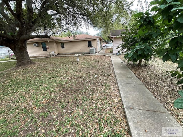 ranch-style house featuring central AC