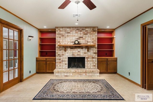 living room with crown molding, a fireplace, ceiling fan, and built in features